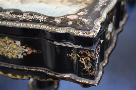 A Victorian papier mache work table W. 1ft 7in. D. 1ft 2in. H. 2ft 6in.